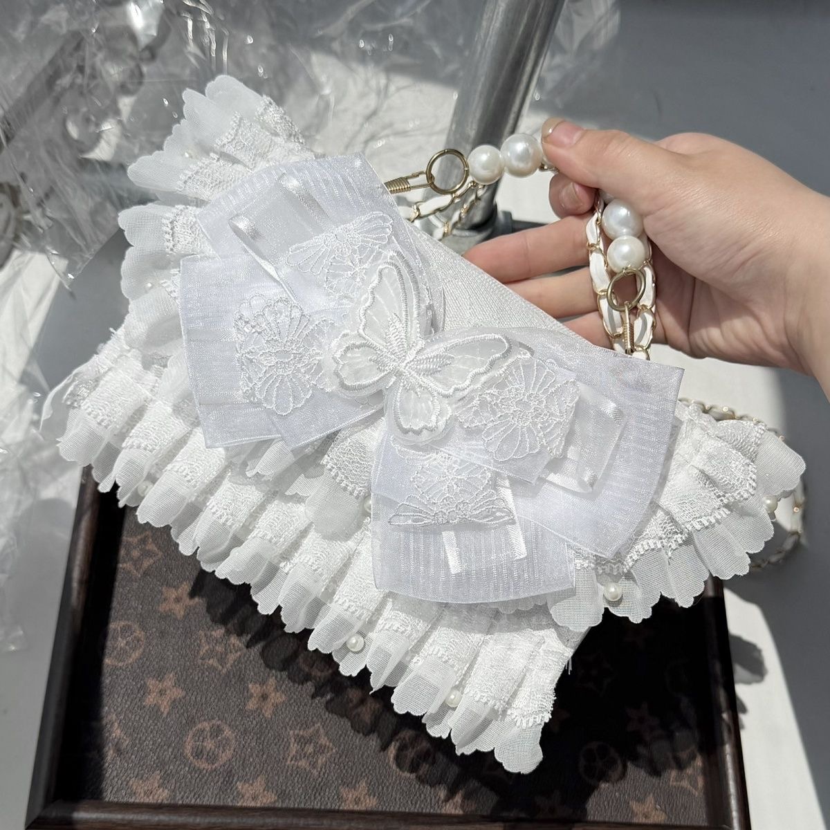 Białe torebki crossbody Lolita – Phone Accessories Design recenzja i cena