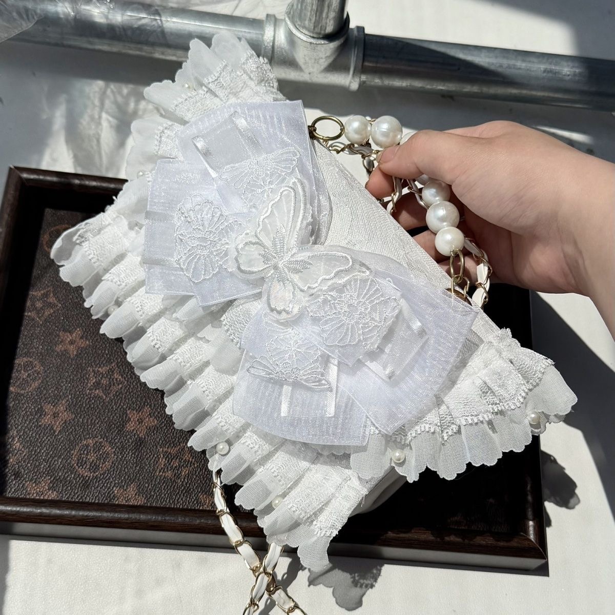Białe torebki crossbody Lolita – Phone Accessories Design recenzja i cena